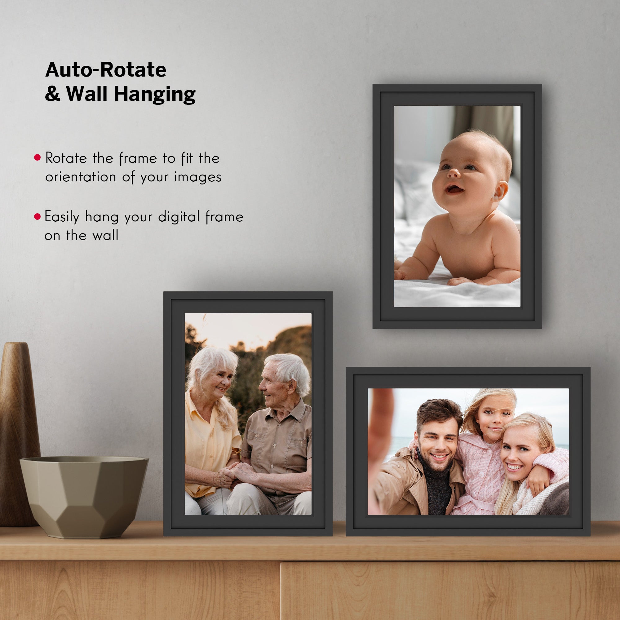 Digital photo frames displaying family photos on a wall and shelf.