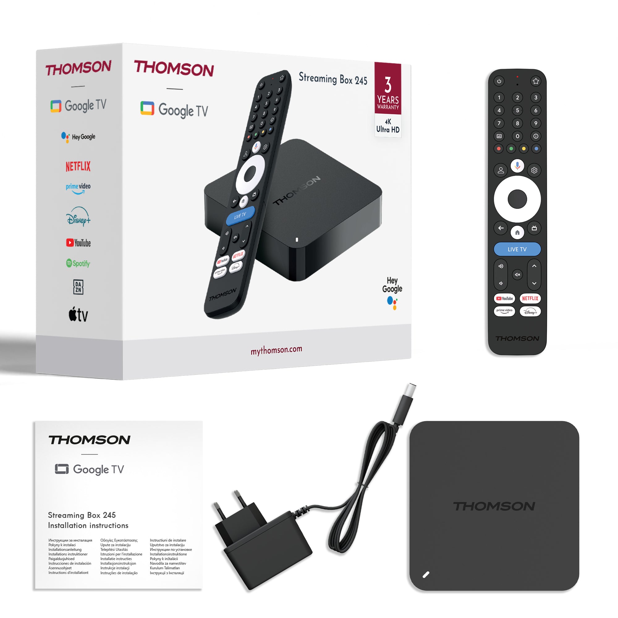 Thomson streaming box with remote control, power adapter, and installation manual on a white background
