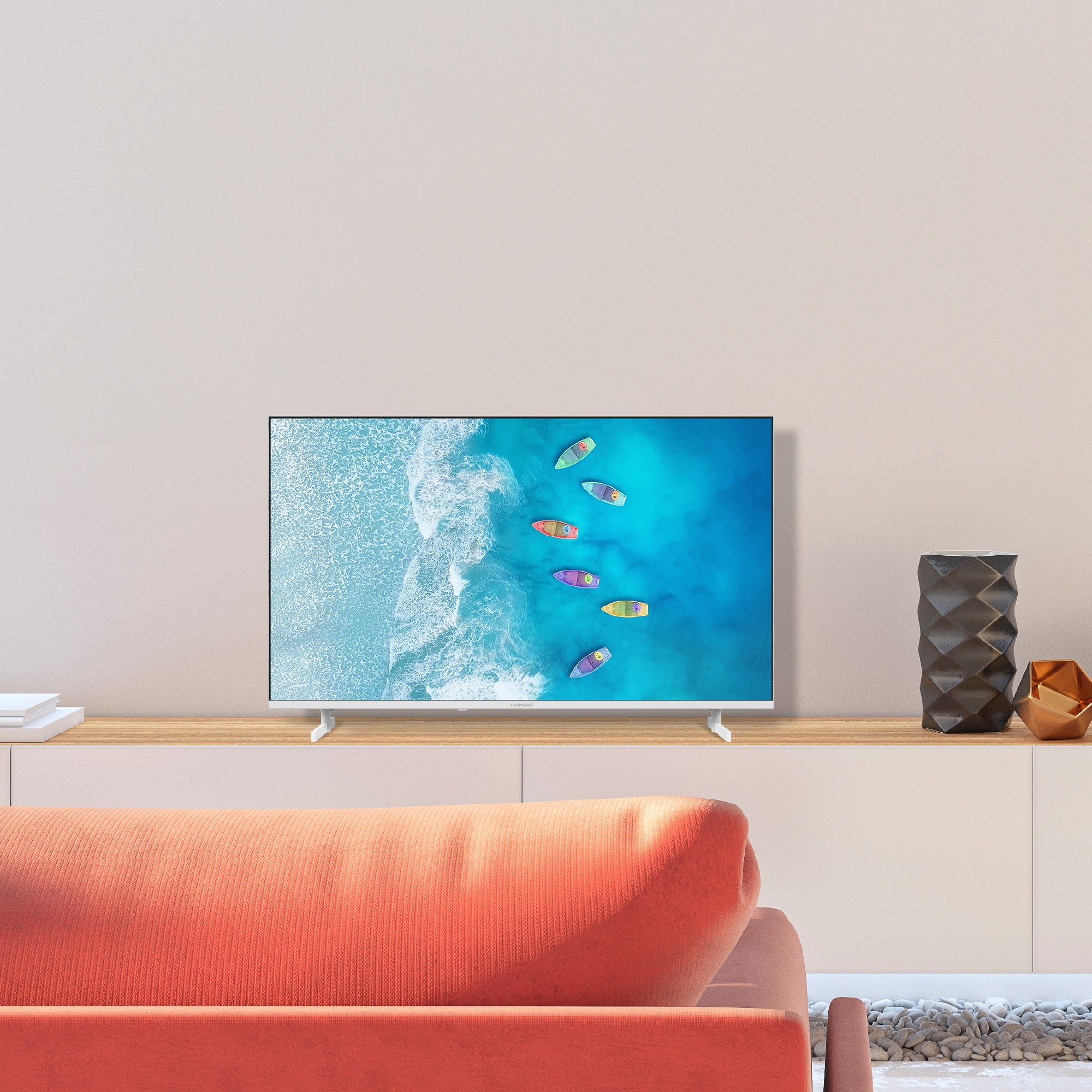 Smart TV displaying an ocean scene with surfers in a living room.