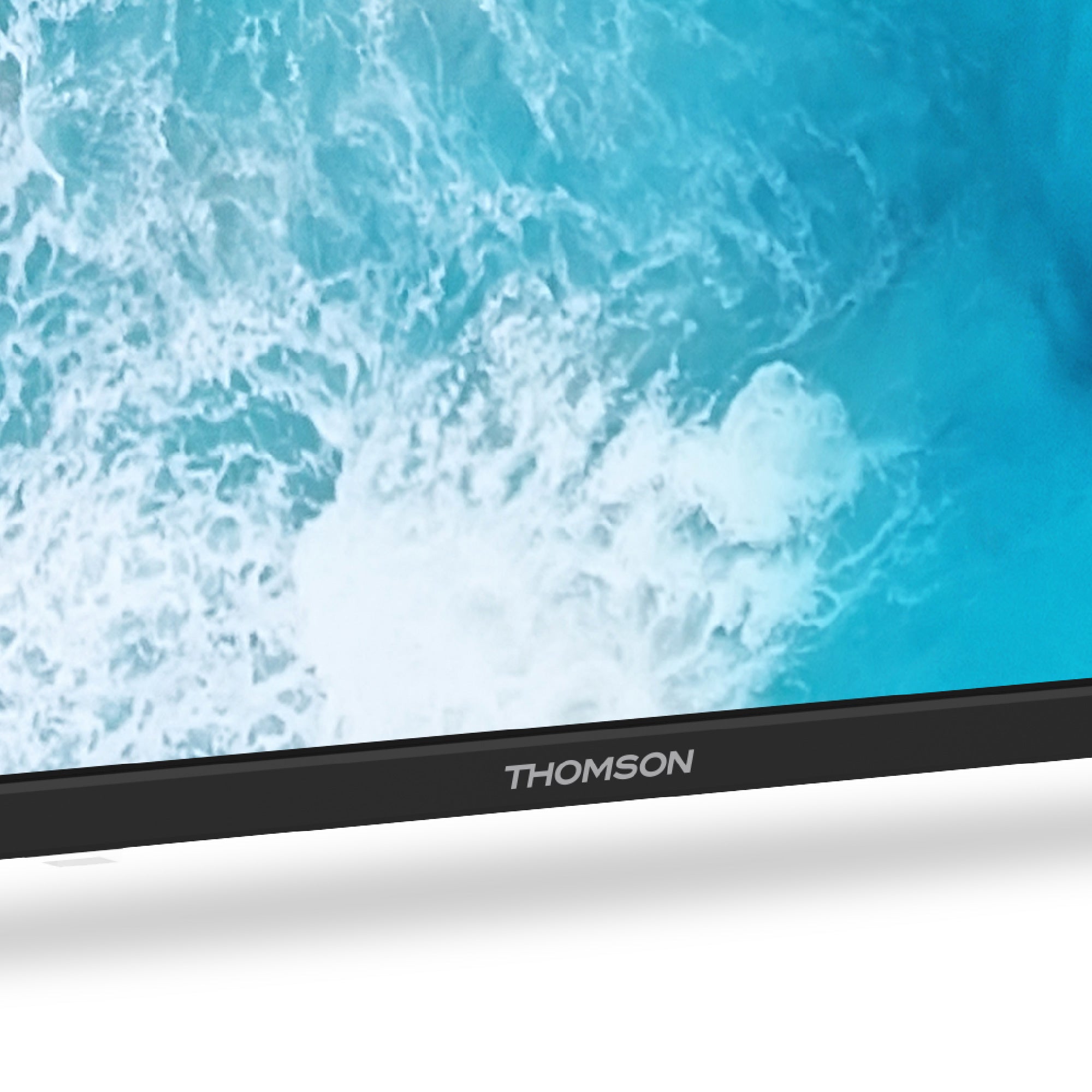 Thomson TV with a blue ocean wave background