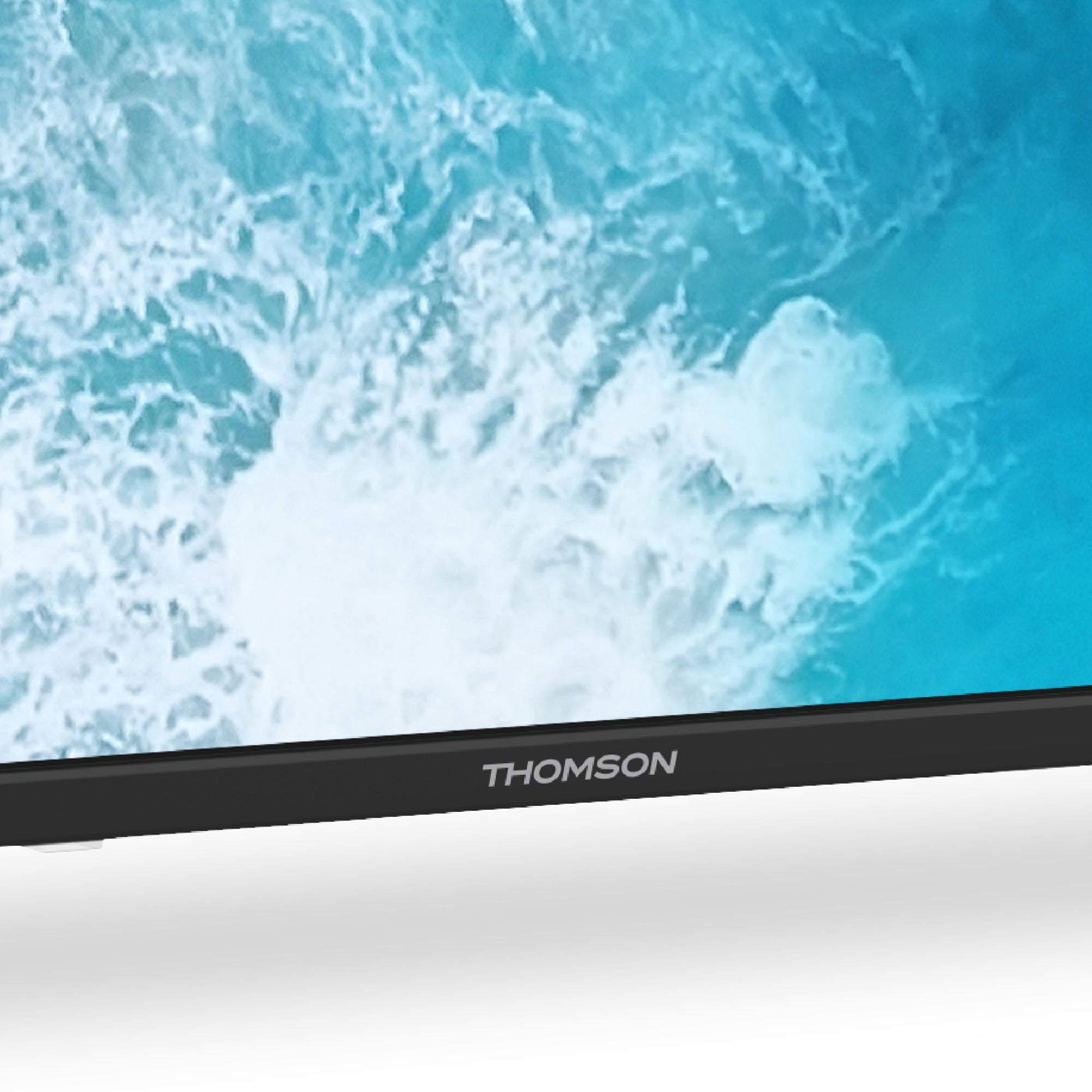 Thomson TV with a blue ocean wave background