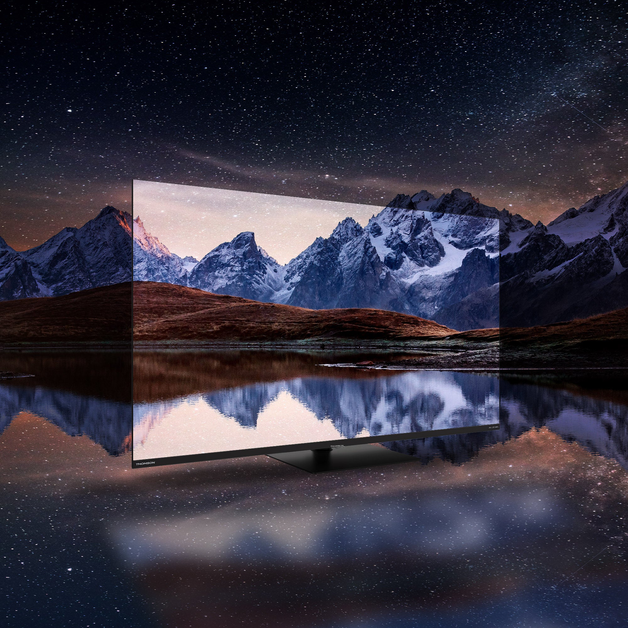 Television displaying a mountain landscape with a starry night sky
