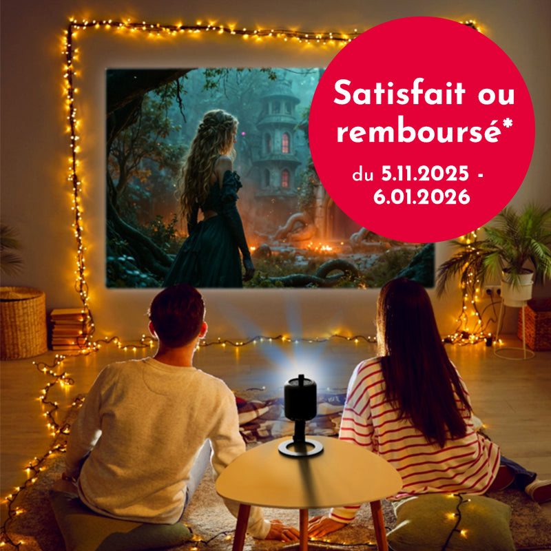 Two people sitting in a cozy room watching a movie projected onto a screen with decorative lights.