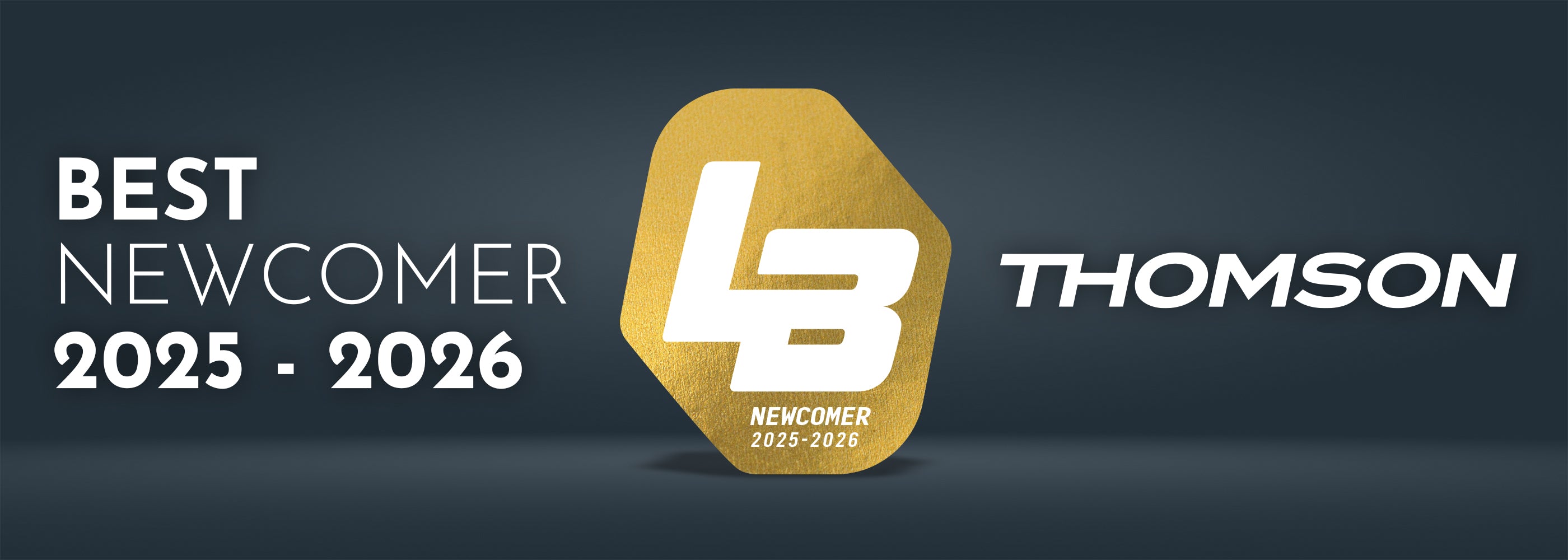 Gold LB logo with 'Best Newcomer 2025-2026' text on a dark background, featuring the Thomson brand.