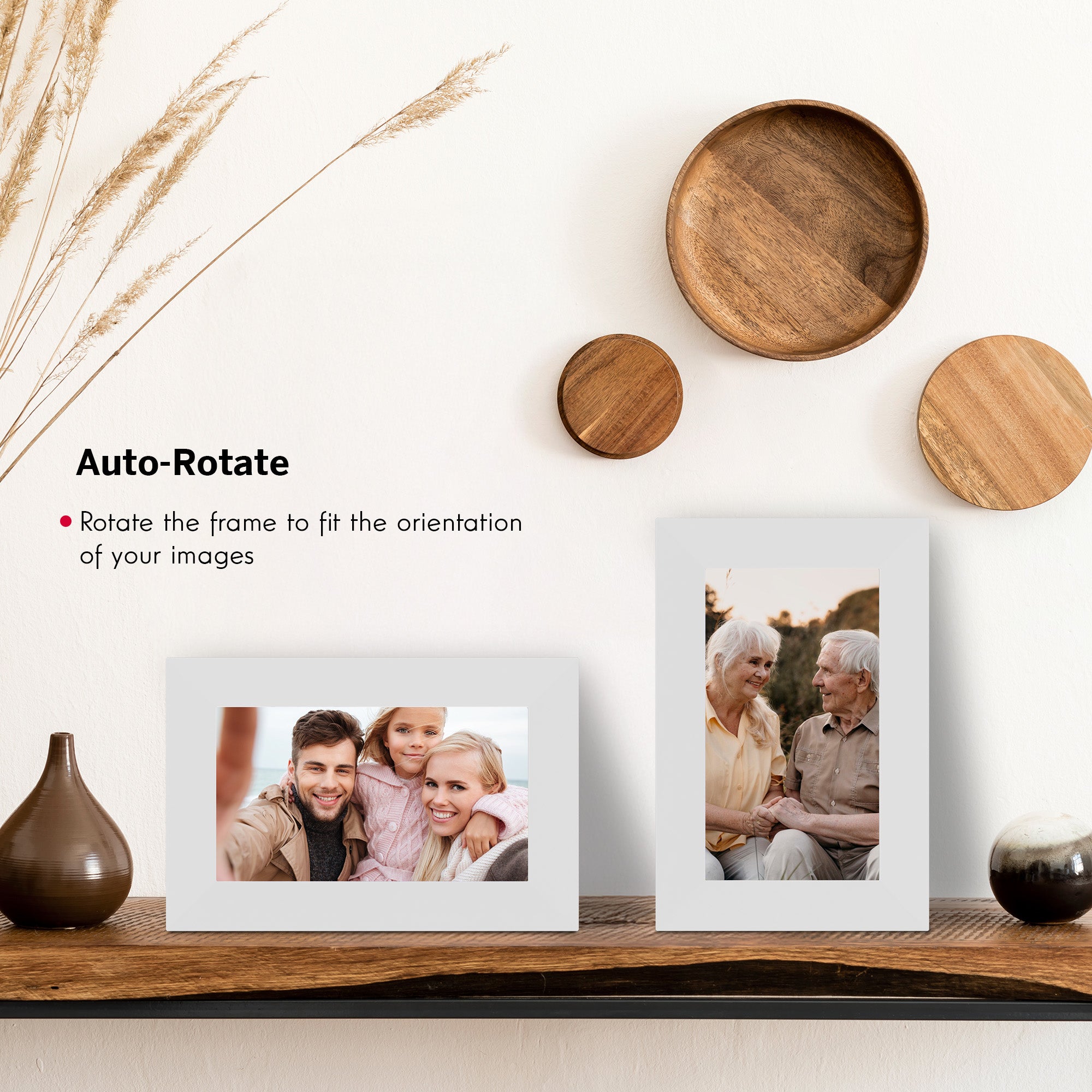 Two photo frames on a wooden shelf with decorative items, featuring text about auto-rotation.
