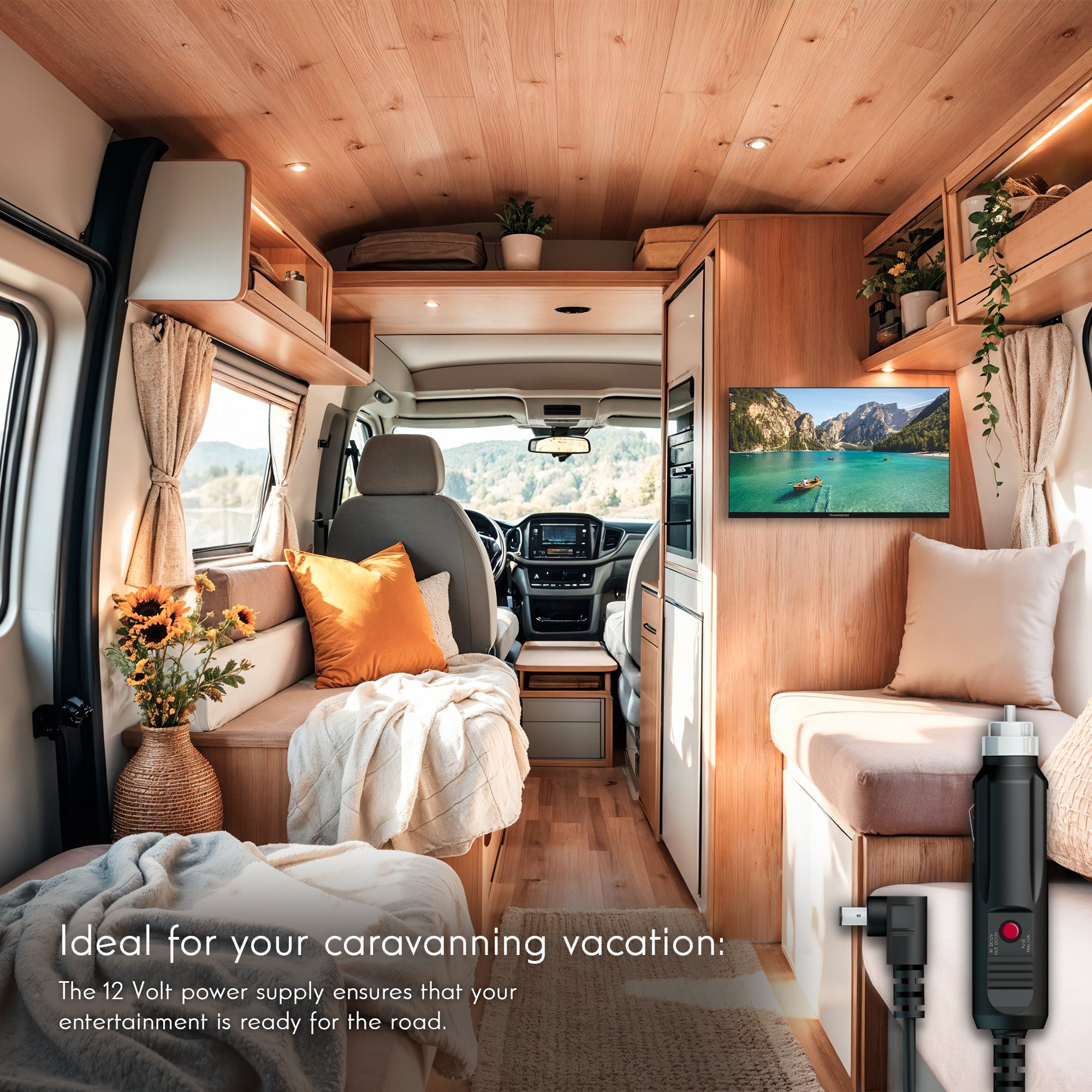 Interior of a modern caravan with wooden walls, comfortable seating, and entertainment setup.