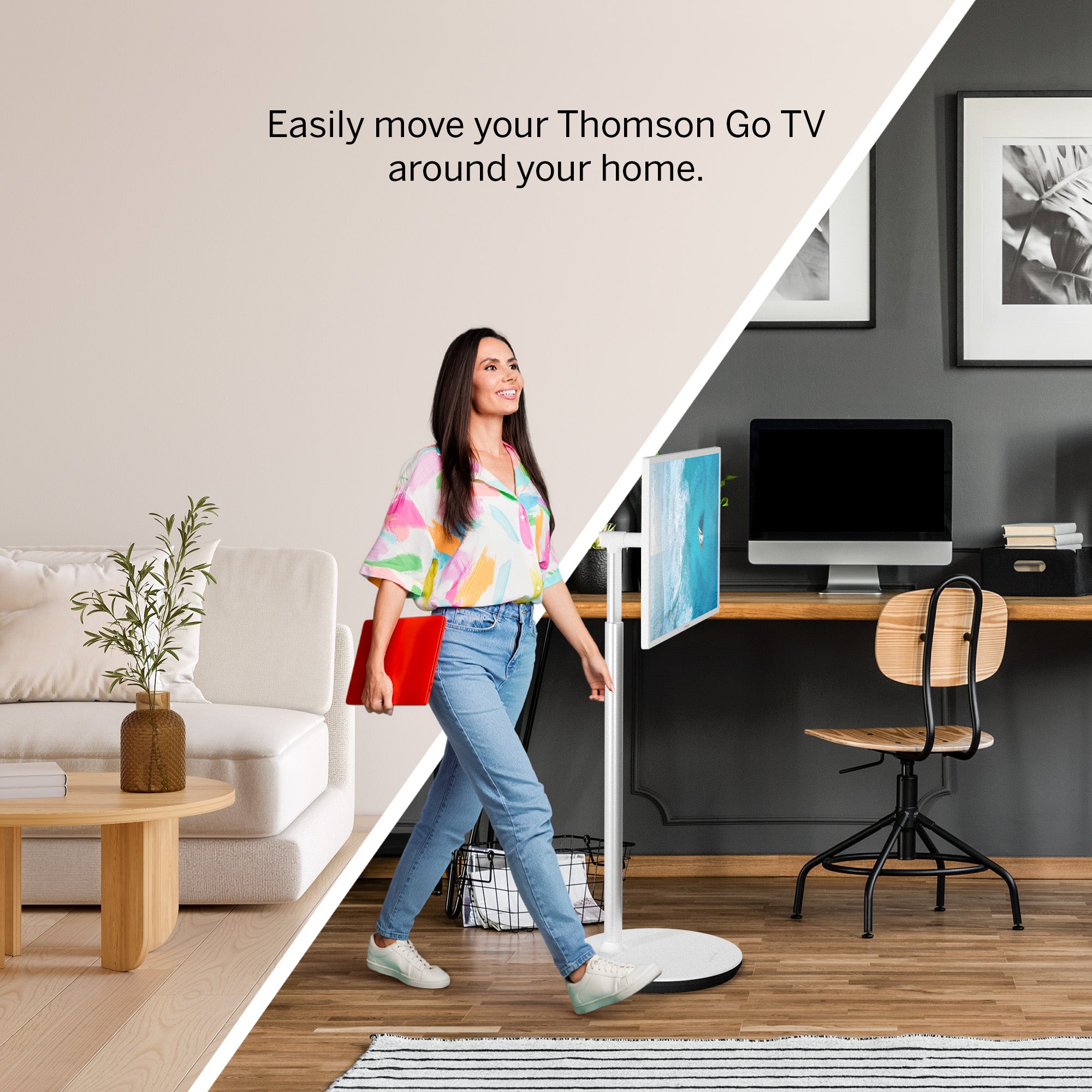 Woman walking with a TV stand in a living room and home office setting.