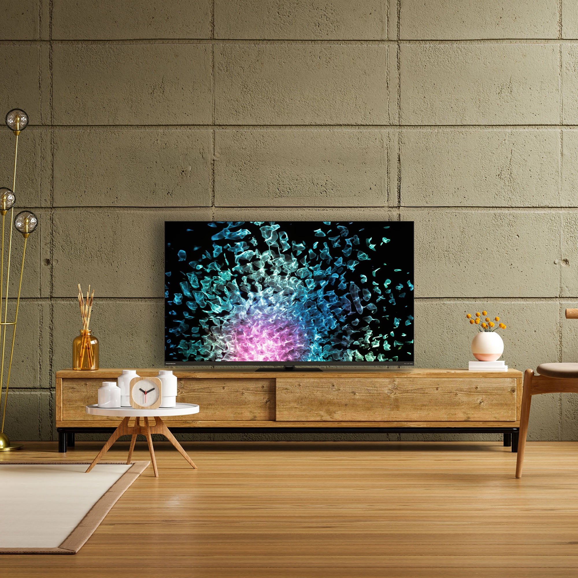 Modern living room with a wooden TV stand and colorful abstract painting on the wall.