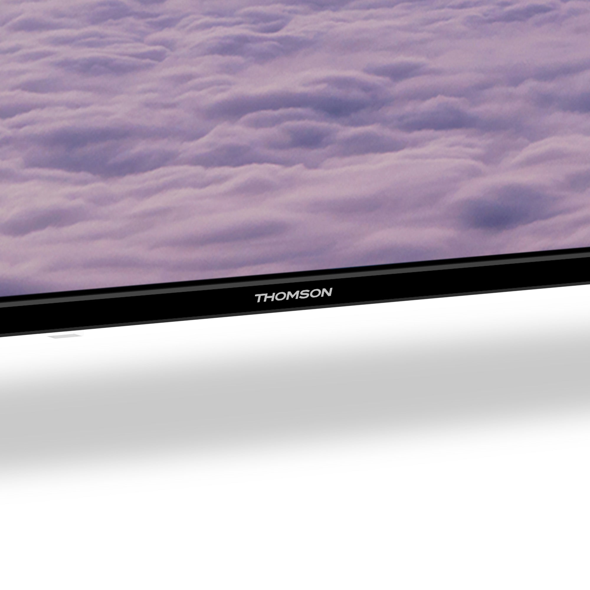 Thomson TV screen closeup  with a purple cloud background