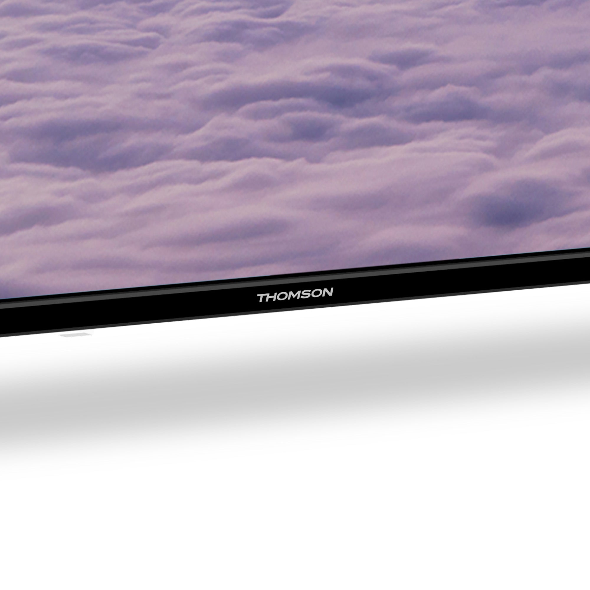 Thomson TV with a purple cloud background