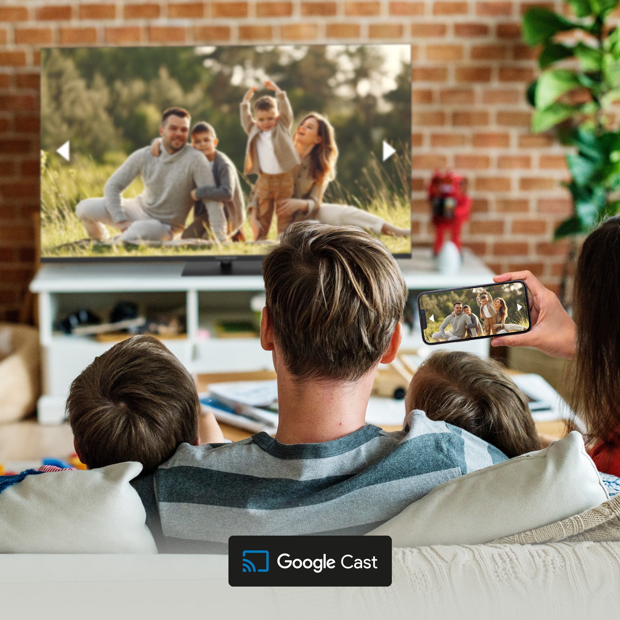Family watching a video on a TV with a smartphone showing the same content, with 'Google Cast' logo.